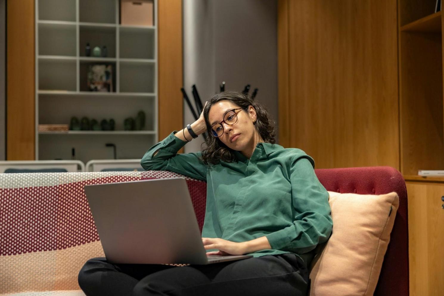 Person reviewing financial documents and planning budget